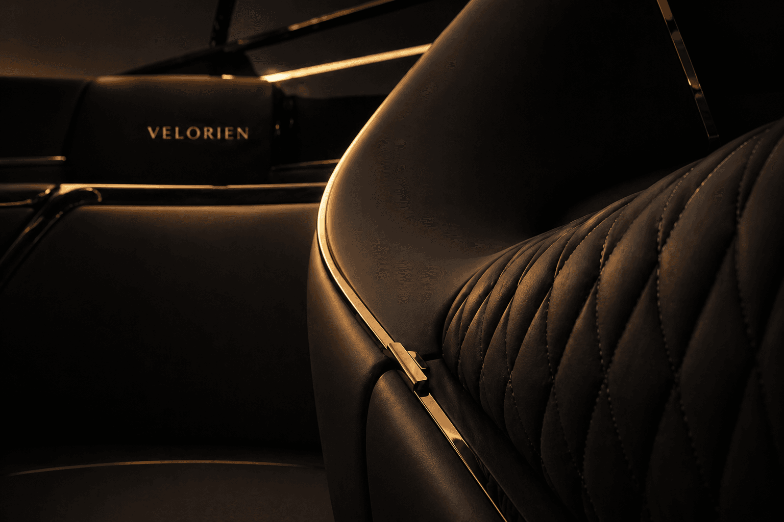 Private Equestrian Architecture close detail of the Velorien armchair showing quilted leather, bronze trim, and ambient glow.